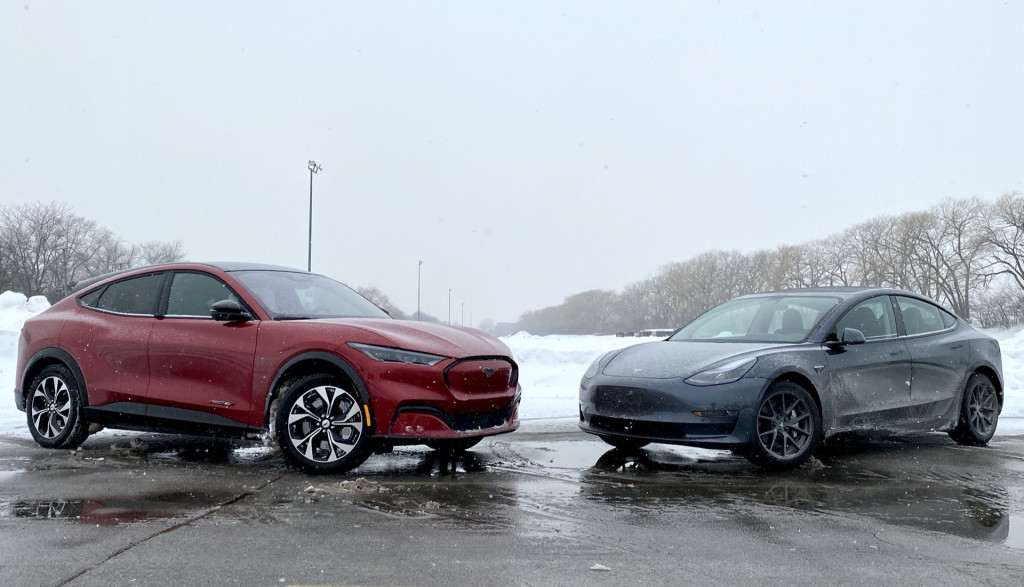 2021 Ford Mustang Mach-E, left, and 2021 Tesla Model 3, right 2021 Ford Mustang Mach-E, left, and 2021 Tesla Model 3, right