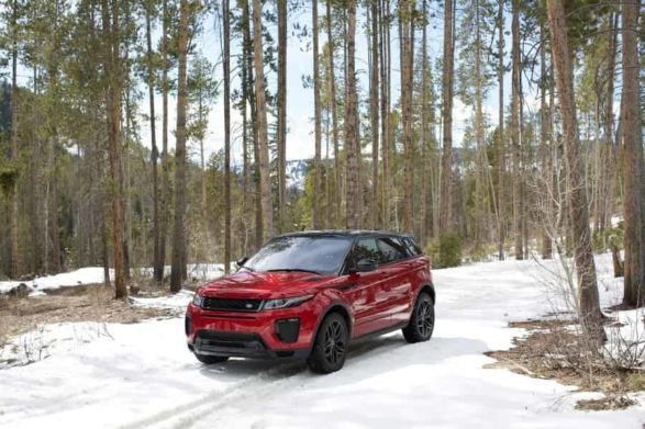 a red and black 2019 range rover evoque