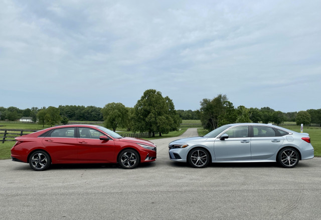2022 Honda Civic Touring, blue, and 2021 Hyundai Elantra SEL, red 2022 Honda Civic Touring, blue, and 2021 Hyundai Elantra SEL, red