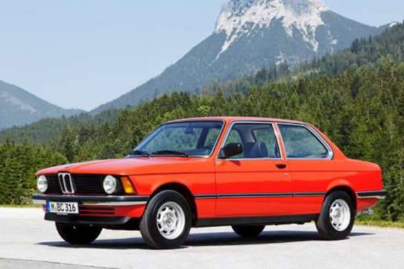 an orange 1977 bmw 3 series