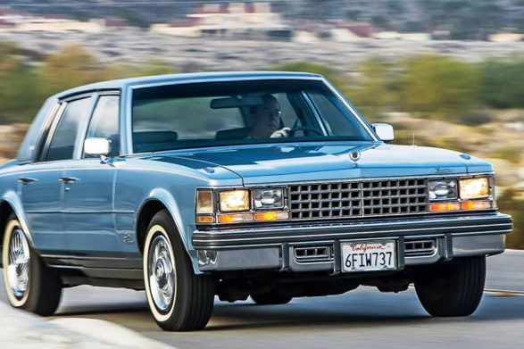 a blue 1976 cadillac seville