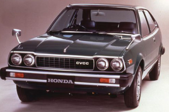 a dark green 1977 honda accord