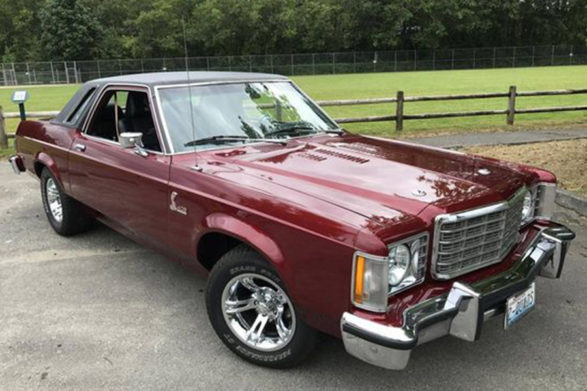 a red 1975 ford granada