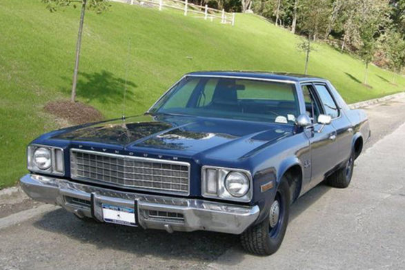 a black 1975 plymouth gran fury