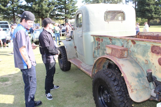 Takoda Martin, left, and Trevor Platt admire a 1940 WC-1...