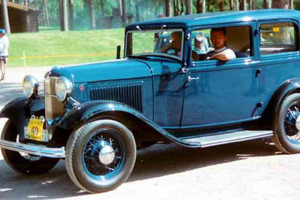 a dark blue ford model b
