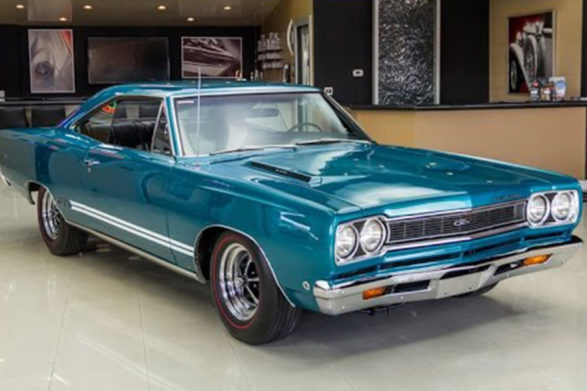 a shiny metallic blue plymouth gtx