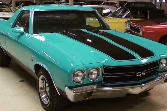 a teal green chevy el camino with black racing stripes